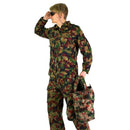 Person wearing Swiss Alpen camo uniform holding a genuine Swiss army backpack with suspenders.