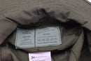 Inside view of Mil-Tec olive ripstop boonie hat showing care label and fabric details.