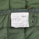 Close-up of label inside original Greek Army M65 quilted liner jacket dated 1991 in green fabric lining