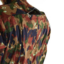 Close-up of original Swiss Alpenflage camouflage coverall suit with visible back zipper and durable fabric details
