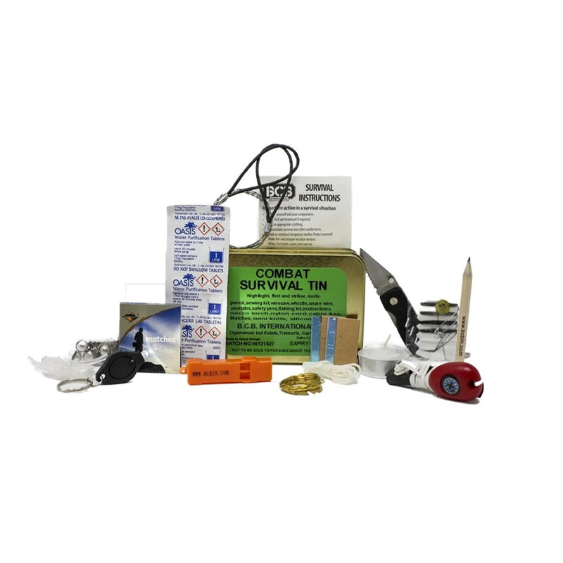 Combat survival kit with various items on a white background