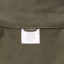 Close-up of olive green Blochl brand fleece jacket label showing size M and windbreaker features