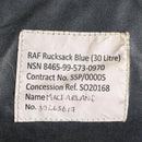 Close-up of the stitched label inside a blue Royal Air Force 30-liter rucksack with serial and contract details.