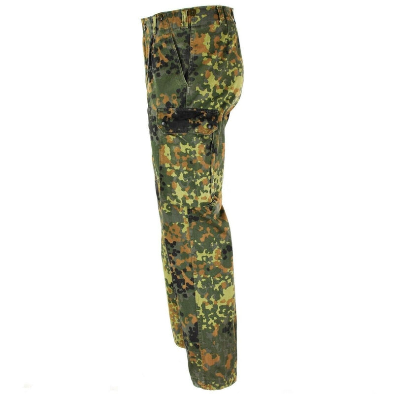 Side view of genuine German army issue flecktarn camo combat pants with cargo pockets and durable fabric
