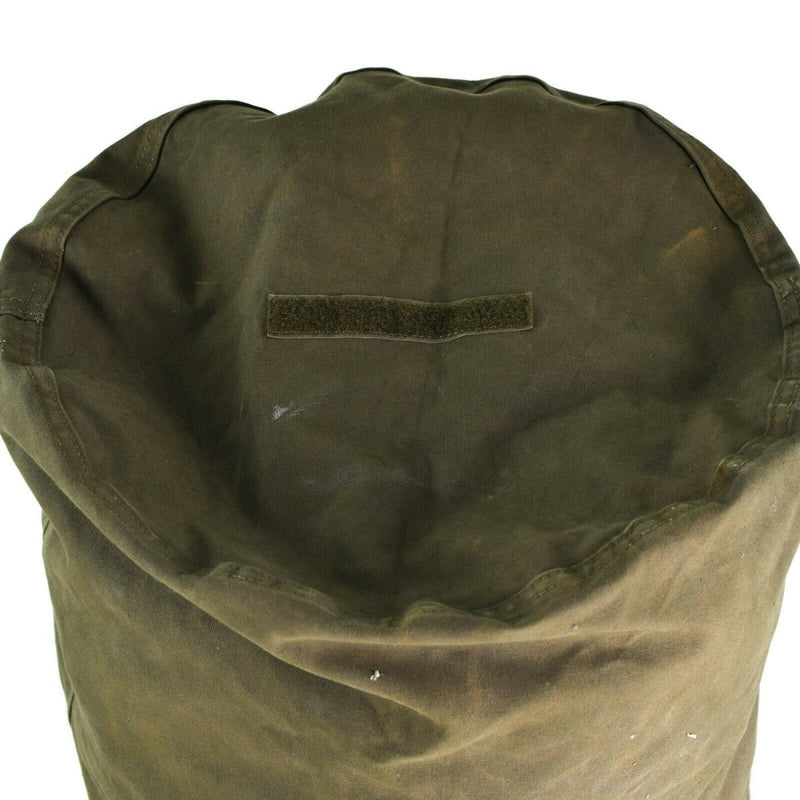 Close-up view of the top opening of a genuine German Army olive green sea sack duffel bag