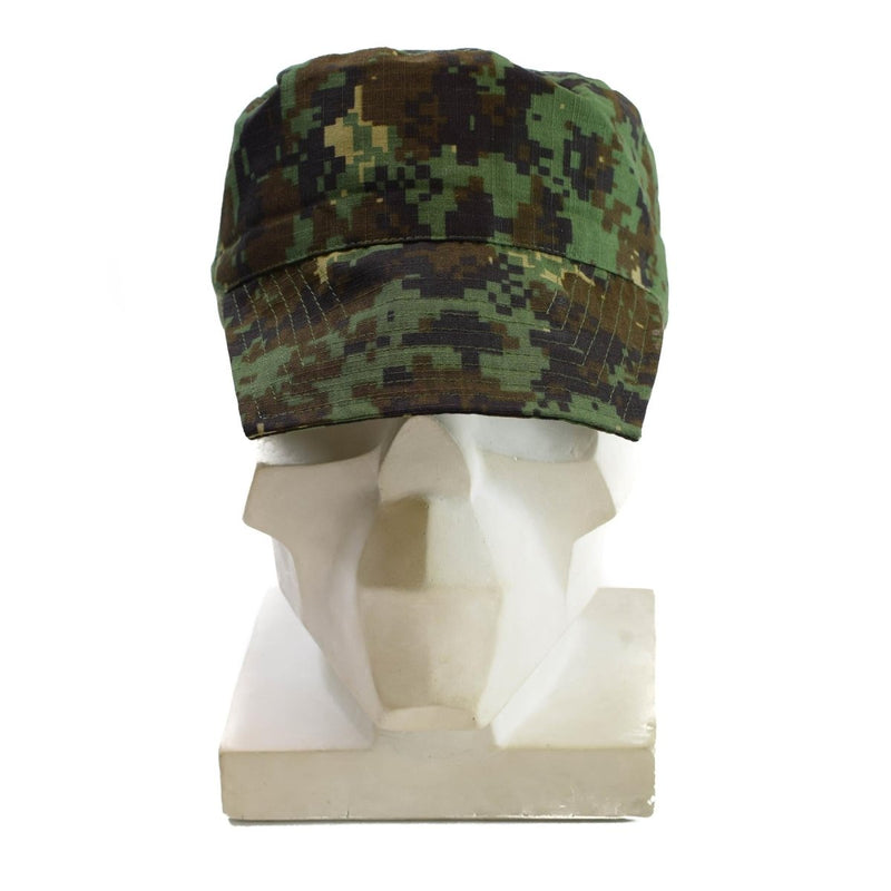 Genuine Guinea Bissau army cap in digital jungle camouflage with adjustable strap and brim for tropical conditions.