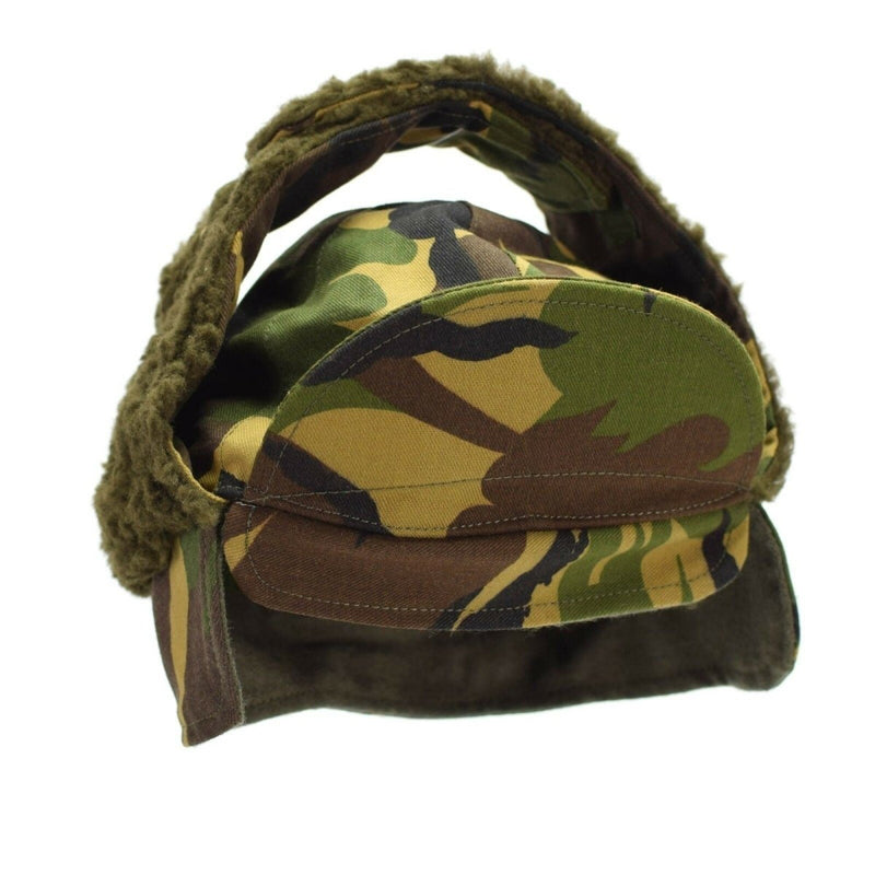 Genuine Dutch military paratrooper winter hat with DPM camouflage and warm faux fur lining for cold weather.