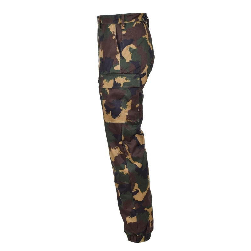 Side view of genuine Hungarian military M1990 woodland camo field pants with reinforced knees and cargo pockets.