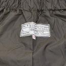 Close-up of label on genuine Italian military rain pants OD olive thermal lined waterproof trousers