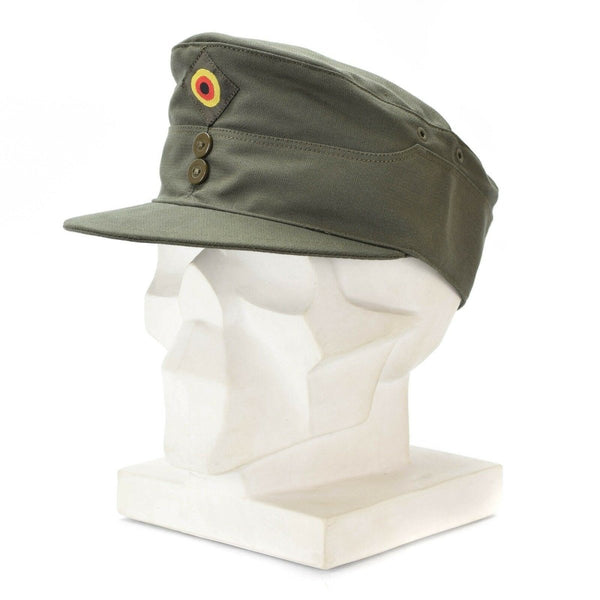 Original German Army olive green summer field cap with curved visor and military insignia on side, displayed on mannequin head.