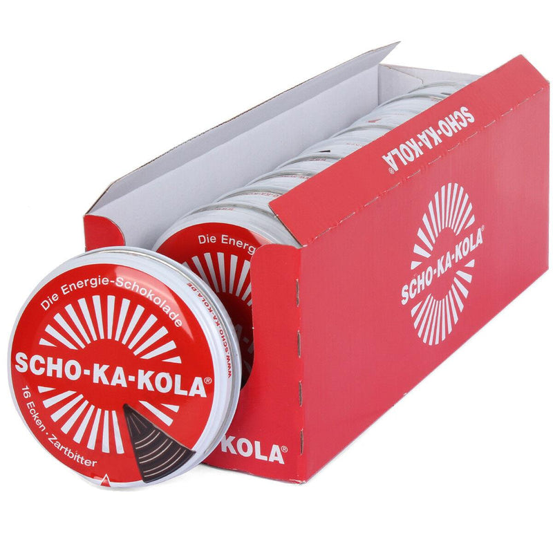 Box of SCHO-KA-KOLA German Energy Dark Chocolate with caffeine in red tins, 100g each, partially opened display packaging