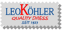 Rectangular fabric clothing label with zigzag edges, displaying 
