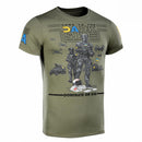 Olive green M-TAC military style t-shirt with tactical soldiers graphic and Ukrainian flag detail on sleeve.