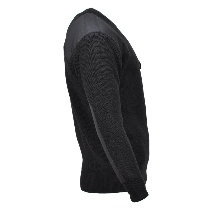 Side view of black MFH Brand commando jumper with rib knit wool and reinforced shoulder and elbow patches