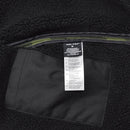 Close-up of MIL-TEC German Military Lumberjack jacket interior showing fabric and care label details