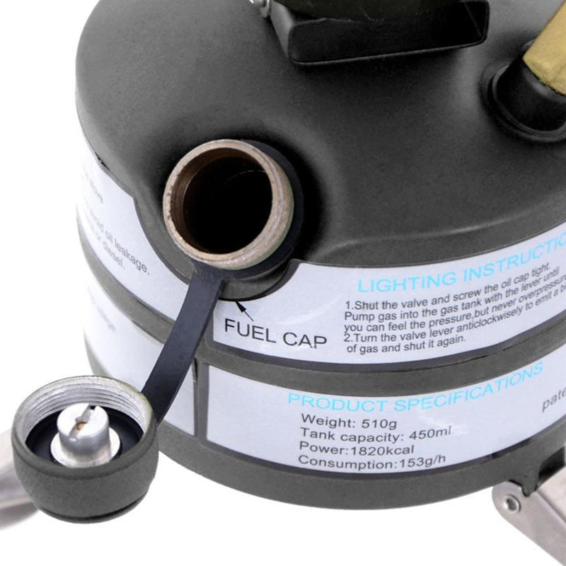 Close-up of MIL-TEC M-95 camping stove fuel tank with open fuel cap and product specifications label visible