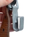 Close-up of metal clip attached to brown leather strap from original Austrian Army Y-Strap braces vintage military surplus