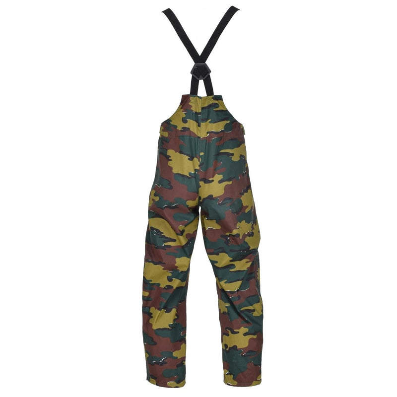 Original Belgian military waterproof pants in jigsaw camo with suspenders, reinforced knees, and multiple pockets.