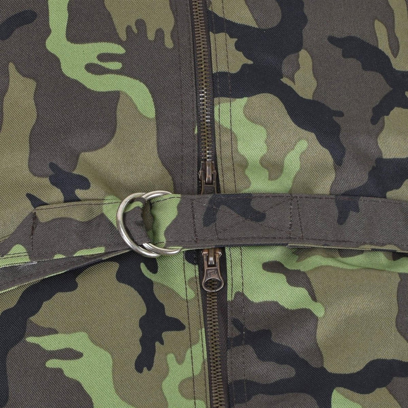 Close-up of Original Czech military duffle bag M95 camouflage fabric with zipper and metal D-ring strap detail