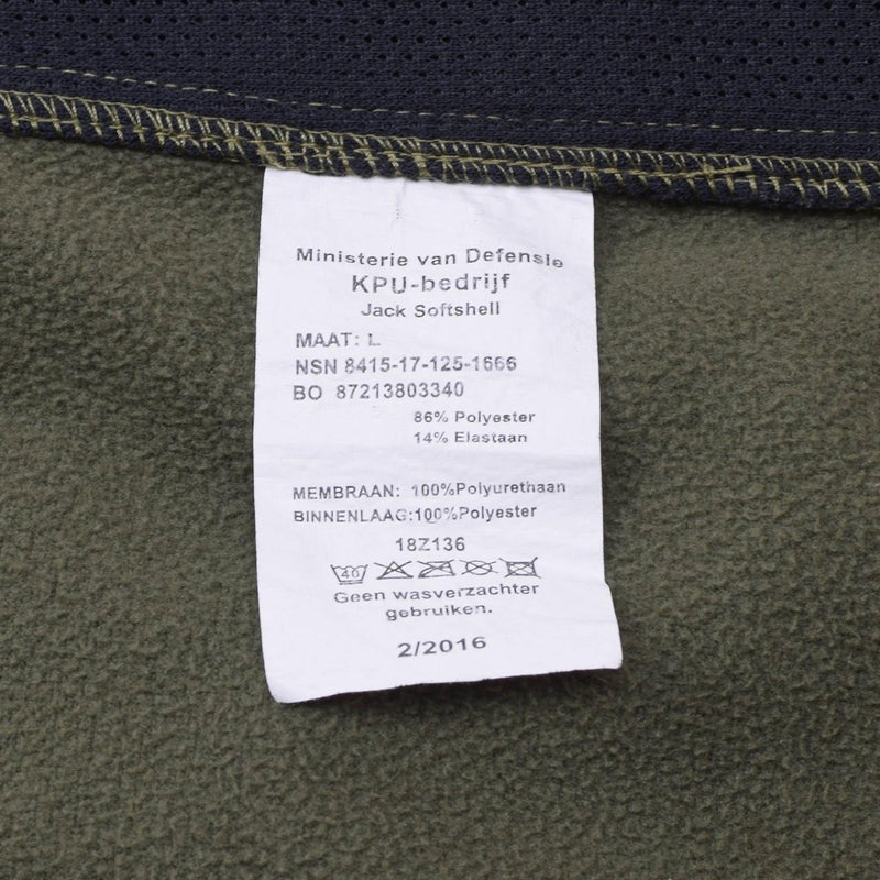 Close-up of the original Dutch Military soft shell jacket label showing material and care details in olive fabric.