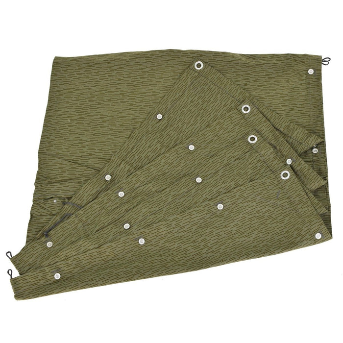 Original East Germany NVA shelter half with raindrop strichtarn pattern and metal button holes for versatile use