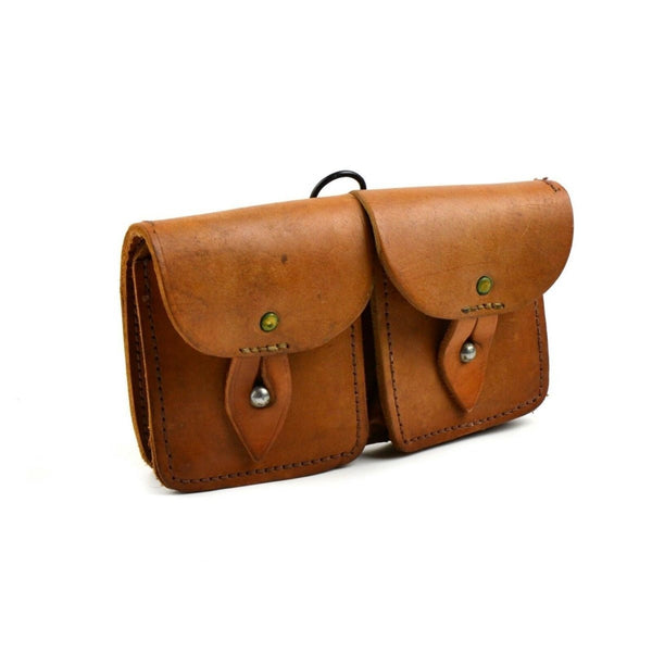 Vintage brown leather French army double magazine pouch with metal button closures and sturdy stitching