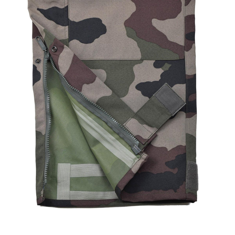 Close-up of waterproof trilaminate French military rain pants with CCE camo and zipper detail