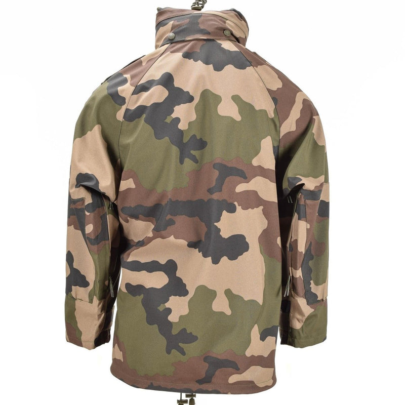 Back view of a French military waterproof trilaminate rain jacket in CCE camouflage pattern with reinforced elbows.