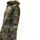 Original German army flecktarn camo field jacket parka with hood, multiple pockets, and German flag patch on sleeve.