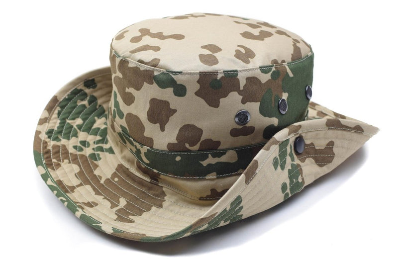 Original German Army tropical camo boonie hat with ventilation holes and wide brim for sun protection in outdoor conditions