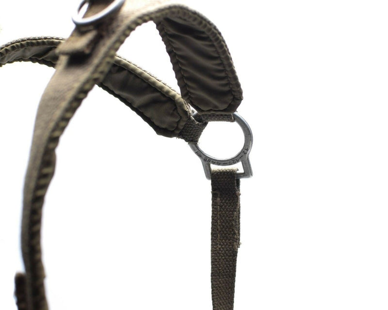 Close-up of original German Army Y-straps field belt suspenders showing metal ring and durable fabric straps