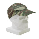 Greek military surplus lizard camo field troops cap displayed on a white geometric mannequin head.