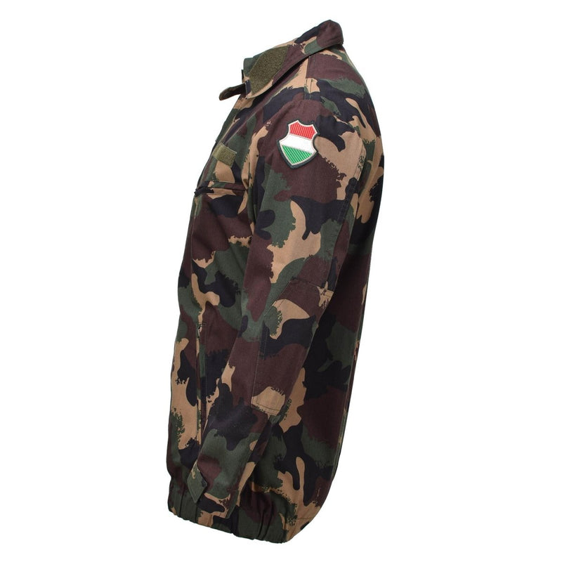 Side view of Hungarian military M1990 field jacket in four-color woodland camouflage with national patch on sleeve