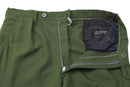 Original Swedish military green formal pants with pleated front, stirrup design, and durable polycotton fabric, partially unzipped.