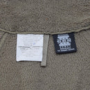 Close-up of official U.S. Army Gen III ECWCS cold weather fleece jacket label in olive color