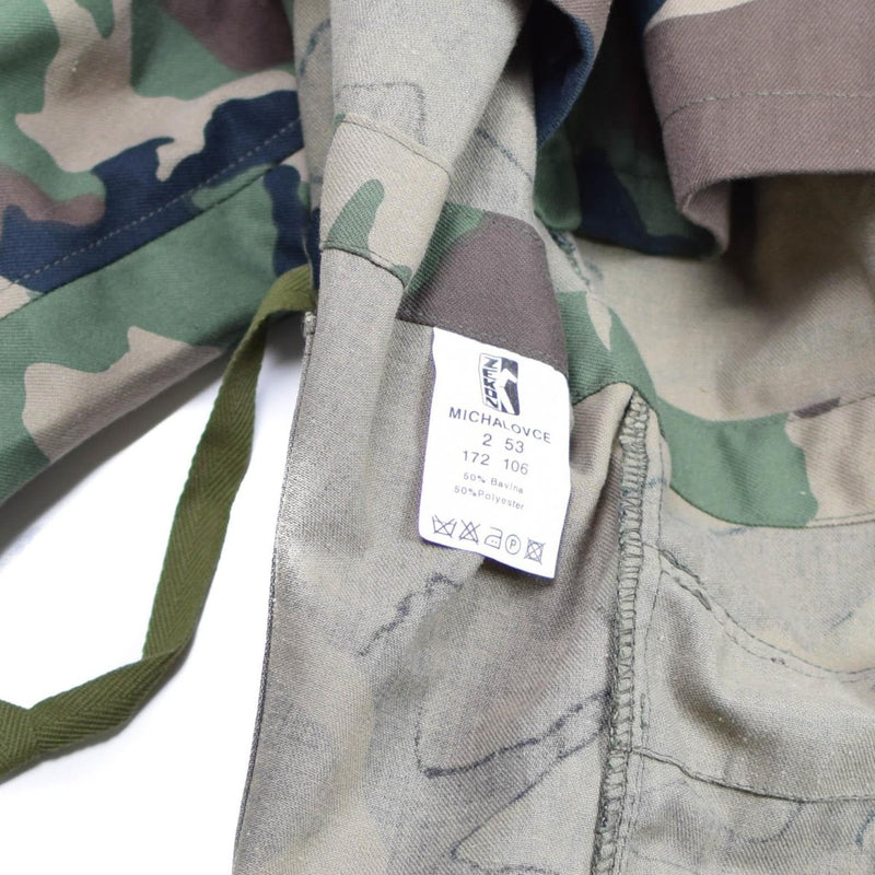 Close-up of the original vintage Slovakian army field jacket M97 camouflage label and fabric details