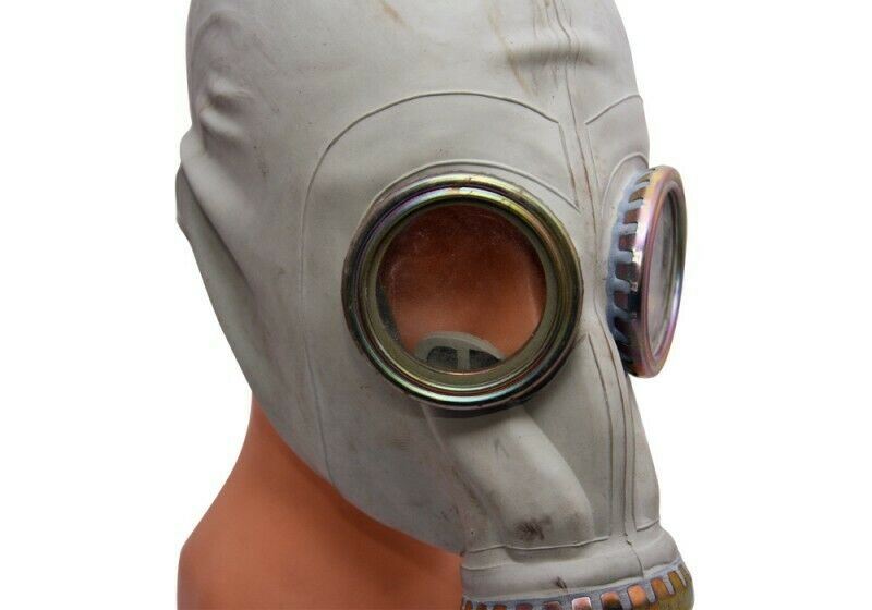 Vintage Polish MP3 MUA gas mask with large eyepieces and front filter canister, from the 1970s military surplus.