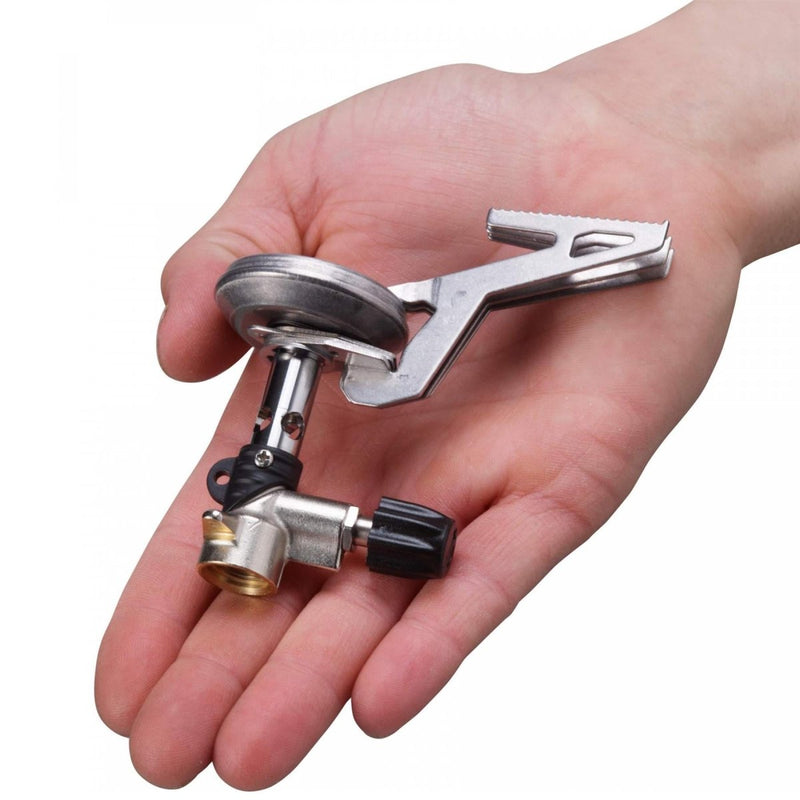 Hand holding compact, lightweight foldable Primus Express hiking stove for outdoor camping use