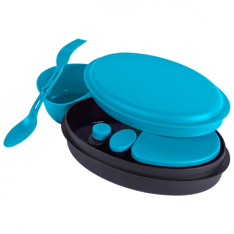 Compact Primus Frigg W Piezo camping mess kit with blue plates, utensils, and storage, ideal for hiking and outdoor meals