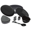 Black Primus Frigg W Piezo camping mess kit with plates, utensils, and containers for outdoor meals