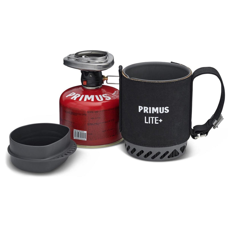 Primus Lite Plus lightweight camping stove set with ceramic coated pot, mug, and fuel canister for outdoor cooking.