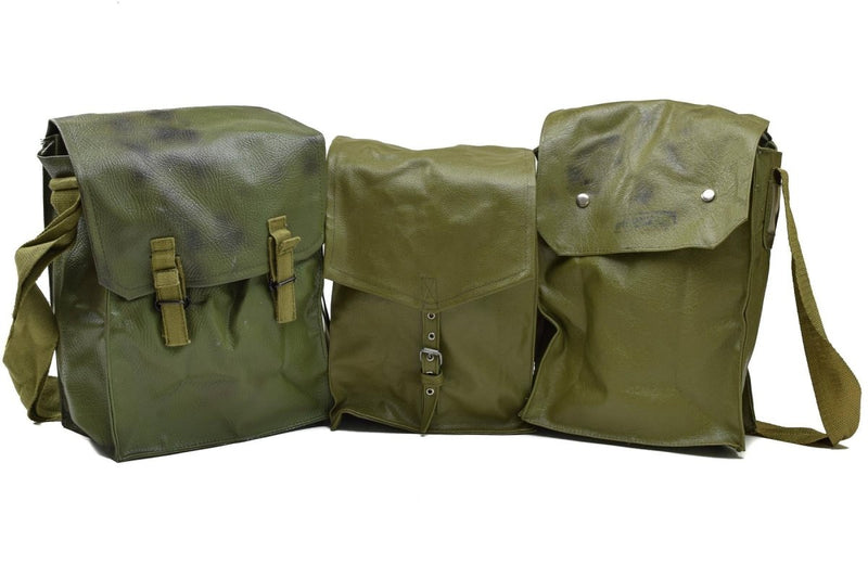 Three vintage olive green military surplus gas mask bags with shoulder straps isolated on white
