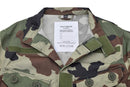Close-up of TACGEAR French military camo commando jacket with button and hook-and-loop fasteners on chest pockets.