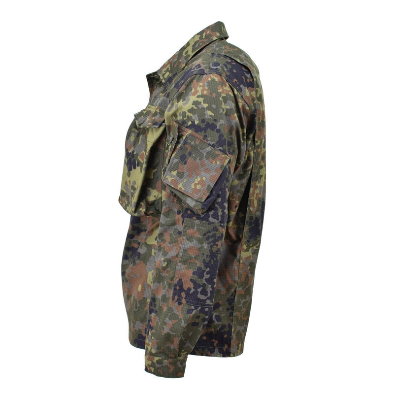 Side view of TACGEAR German military style field jacket with Flecktarn camo and multiple pockets for outdoor use