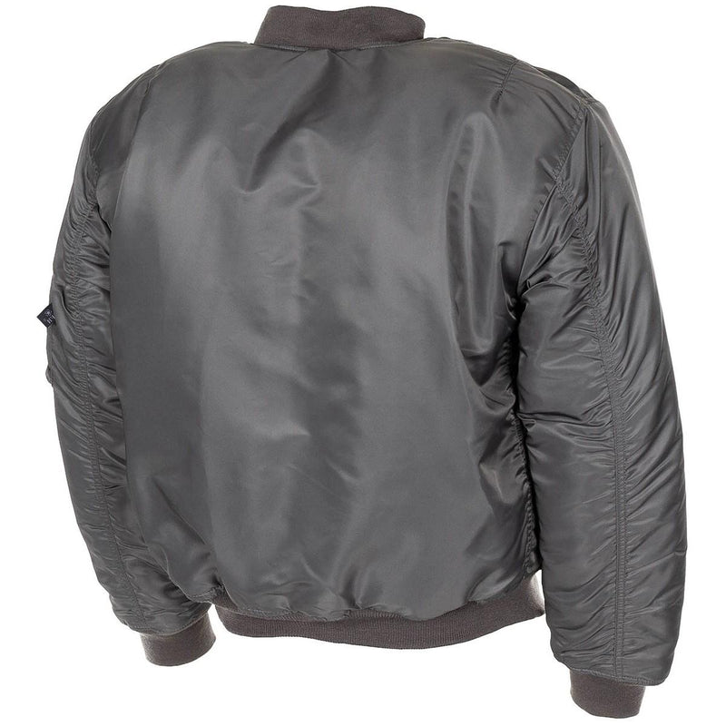 Back view of U.S. Army style MA1 bomber jacket in urban grey with ribbed cuffs and waistband, windproof puffer design.